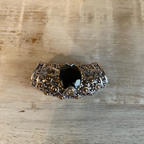 Jewelry - Silver & gold accents in this topaz pendant.